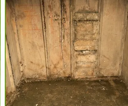 The same garage emptied down to a bare floor and clear walls